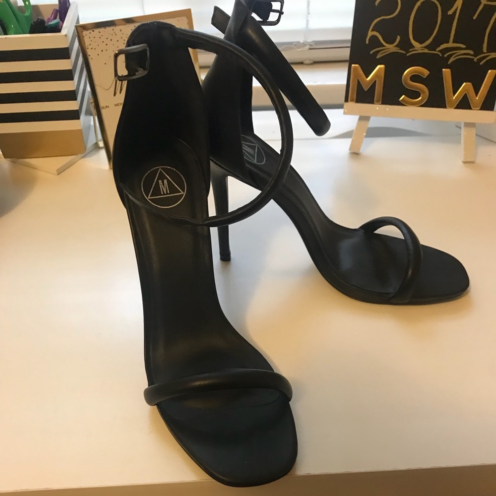 Round black strap heels